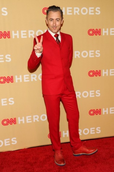 alan Cumming red suit